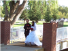 A bride escorted across the bridge onto the island