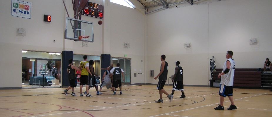 Kids Playing Basketball in Gym