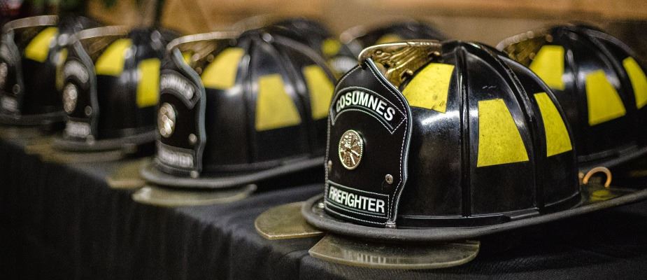 Image of fire helmets in a row