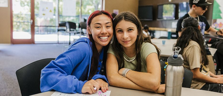 Leader and student at the teen center