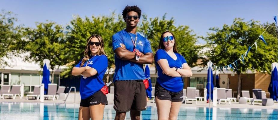 Picture of Lifeguards in front of the pool 