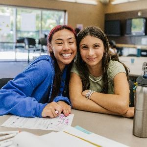 Teen and Staff member in the Teen Center